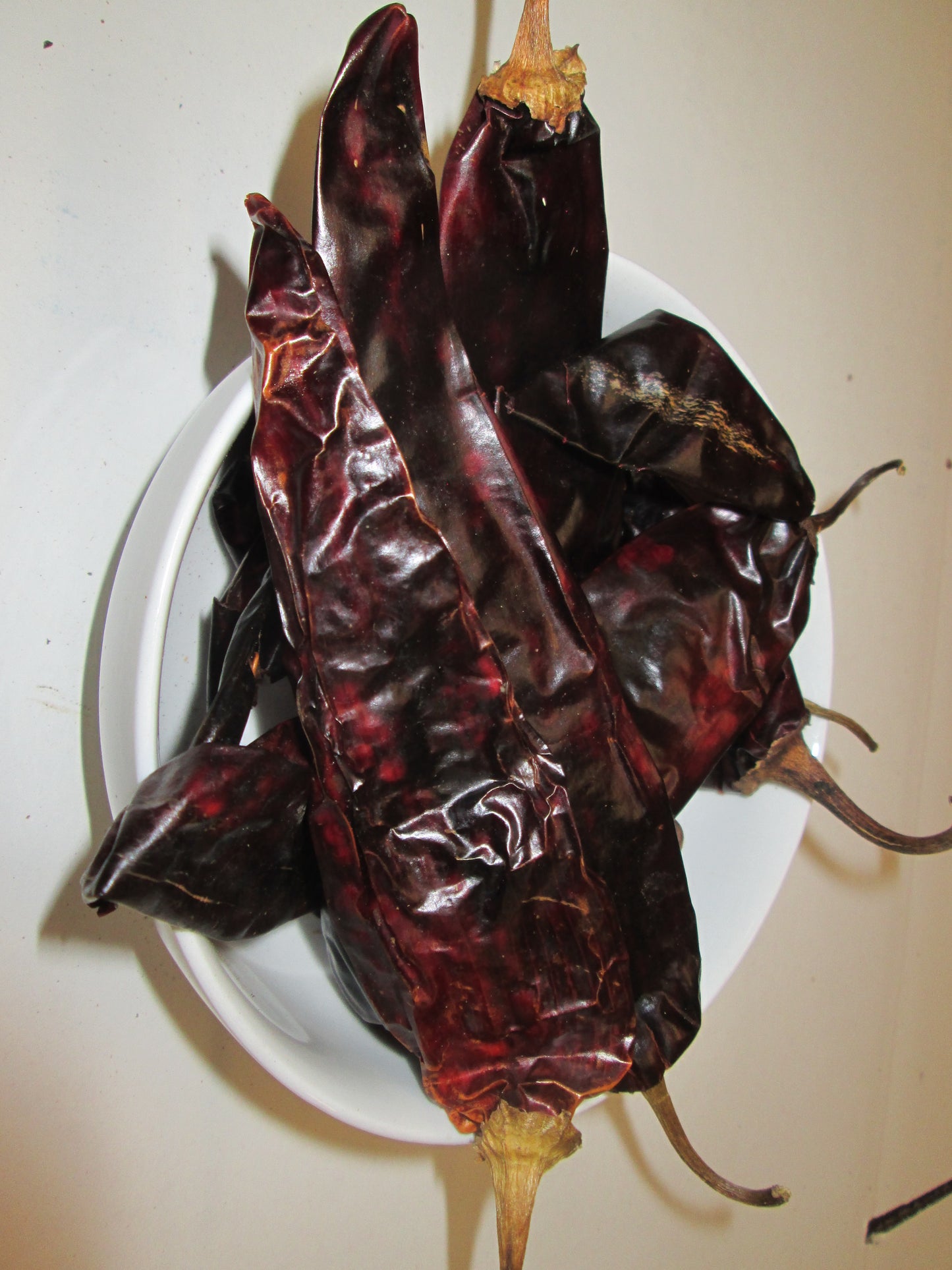 Dried New Mexico Whole Chiles with stem , 25 lbs